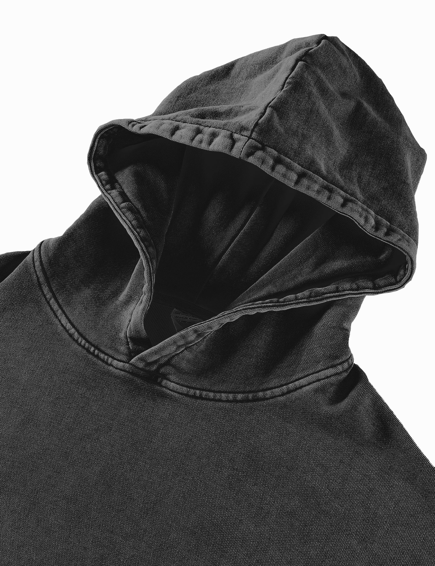 Detailansicht des Materials der Kaputze des Oversized Acid-Wash-Hoodies in Schwarz