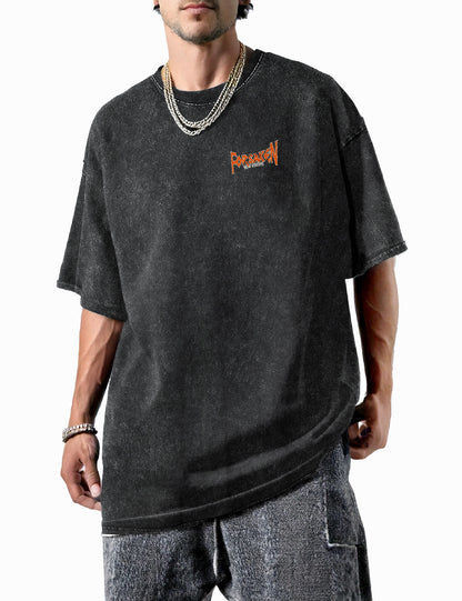 Model trägt Oversized Acid-Wash-T-Shirt in Schwarz mit Skelett-Design, Frontansicht.